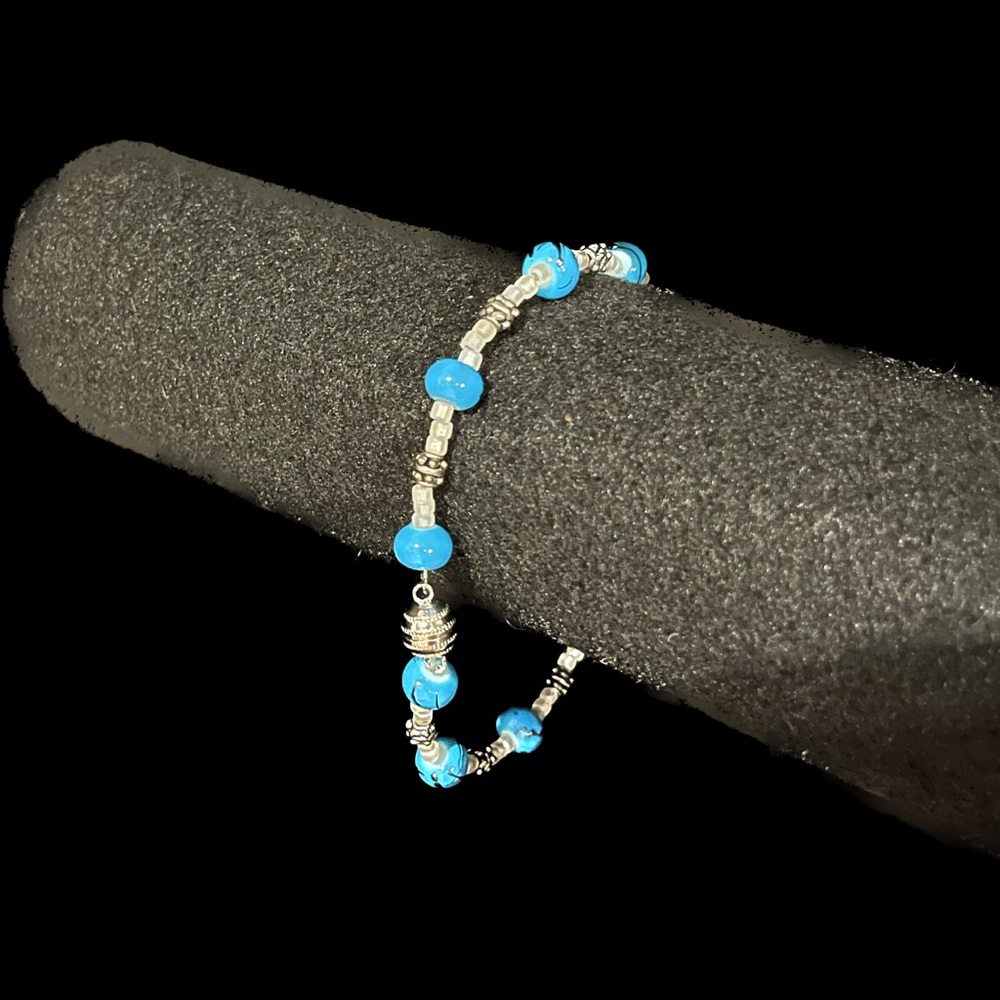 Blue & black glass beaded bracelet or anklet with silver accents.